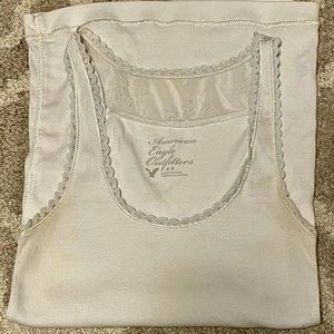American Eagle ivory tank top with lace trim, small.